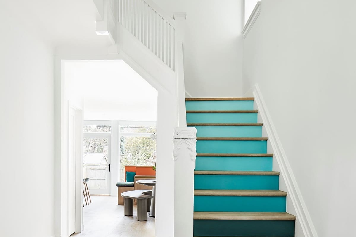 Blue staircase to second-storey of Toronto home renovation-1