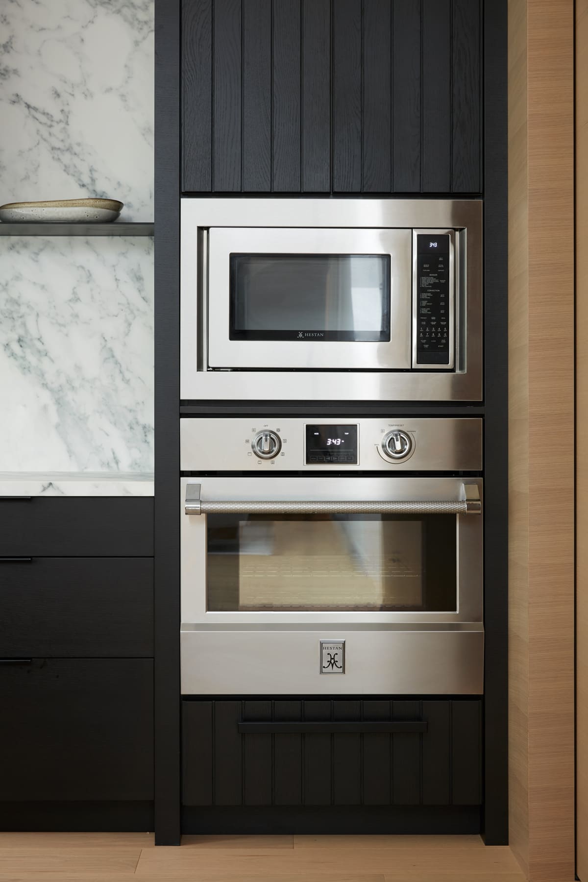 Hestan oven and microwave in high-end custom kitchen by SevernWoods 